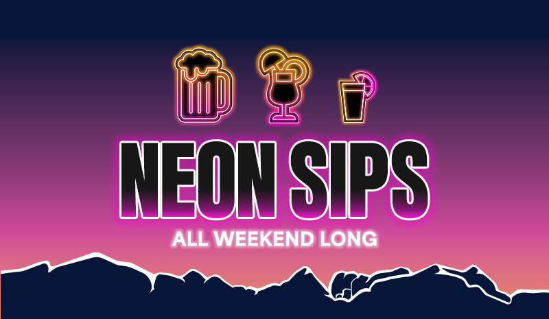 Neon drink icons above “NEON SIPS” and “ALL WEEKEND LONG,” with a mountain silhouette and rooms nestled at the base.
